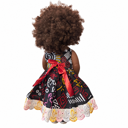 Poupée noire Rubiyatou 45 cm aux cheveux bouclés auburn